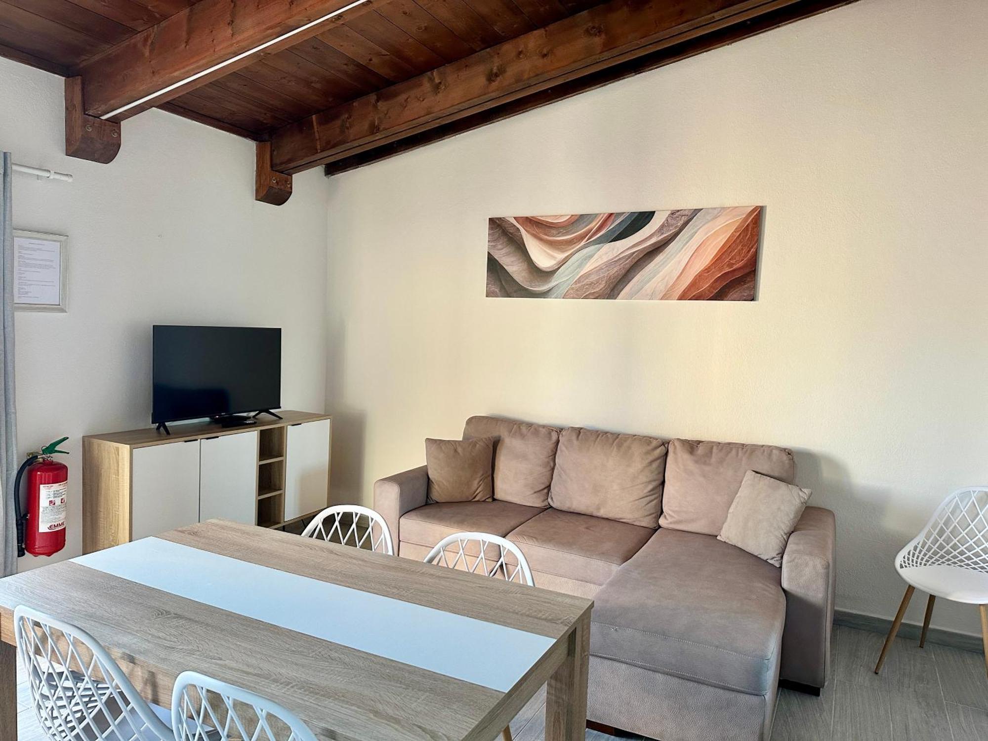 Approdo Apartments Isola Rossa Exterior photo