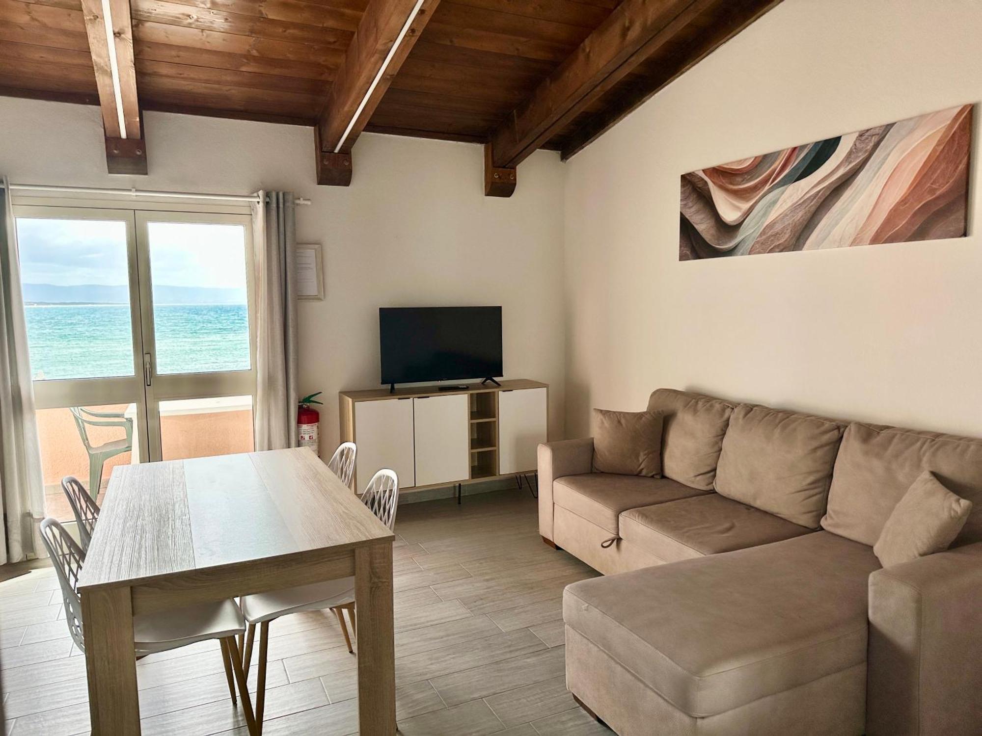 Approdo Apartments Isola Rossa Exterior photo