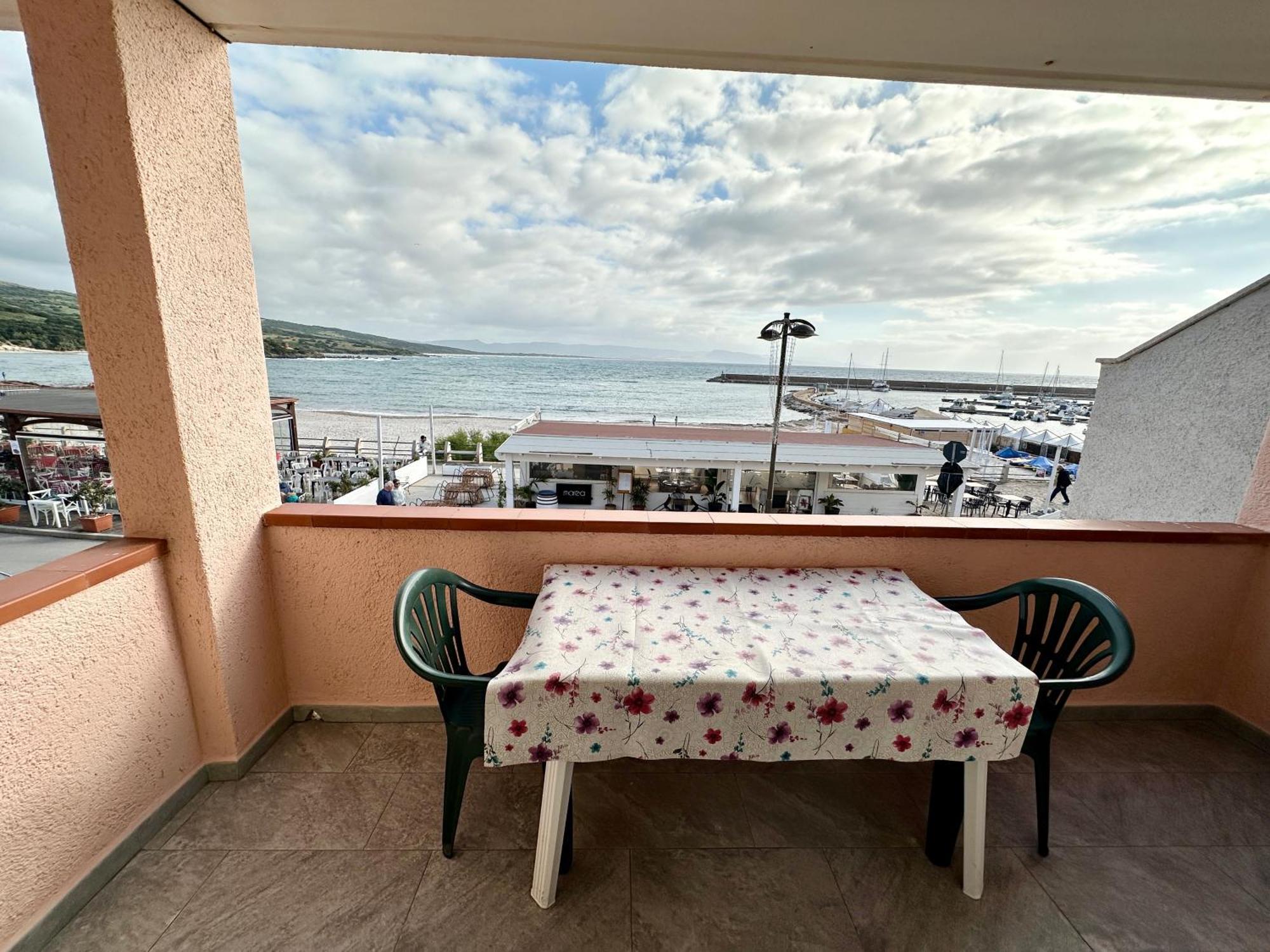 Approdo Apartments Isola Rossa Exterior photo